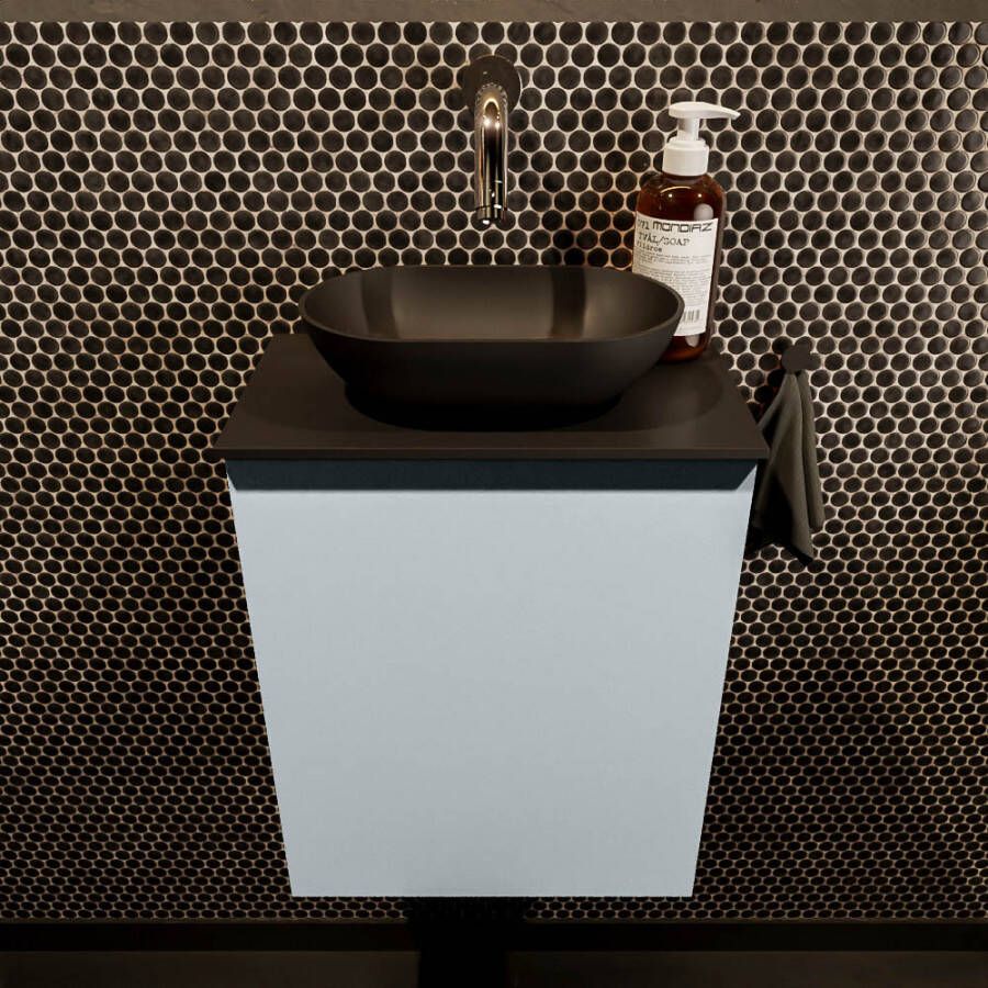 Mondiaz Fowy toiletmeubel 40x50x23cm clay mat 0 kraangaten wasbak: midden 1 deur solid surface met blad MDF kleur wasbak: zwart FOWY59003clayurban