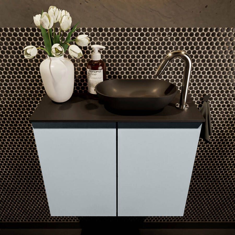 Mondiaz Fowy toiletmeubel 60x50x23cm clay mat 1 kraangat wasbak: rechts 2 deuren solid surface met blad MDF kleur wasbak: zwart FOWY59009clayurban