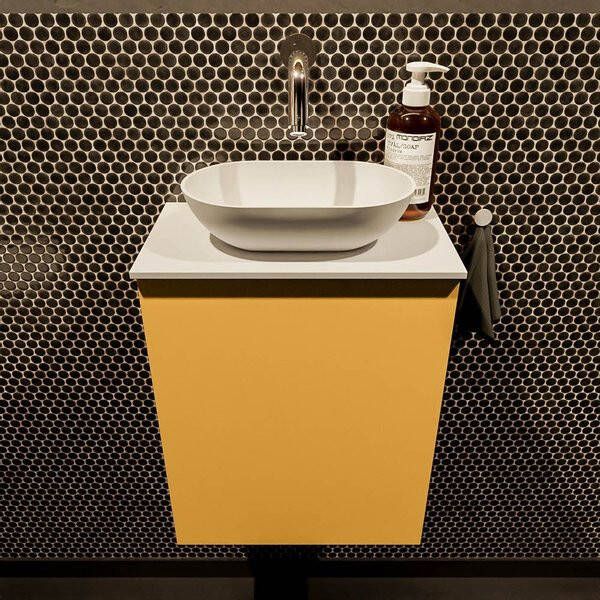 Mondiaz Fowy toiletmeubel 40x50x23cm ocher mat 0 kraangaten wasbak: midden 1 deur solid surface met blad MDF kleur wasbak: Oranje Wit FOWY59003ocherocher