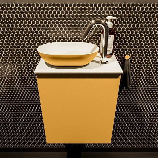 Mondiaz Fowy toiletmeubel 40x50x23cm ocher mat 1 kraangat wasbak: links 1 deur solid surface met blad MDF kleur wasbak: zwart FOWY59001ocherurban